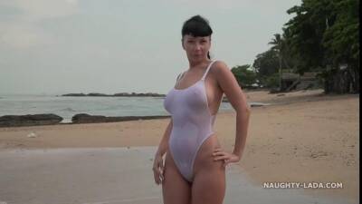 Naughty Russian MILF in White see thru swimsuit outdoors in public resort - sunporno.com - Russia