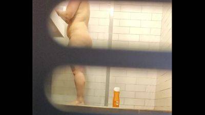 Chubby pussy farting MILF in a hostel shower - voyeurhit.com