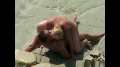 Our Nudist Mom With Her Lover In The Surf - hclips.com